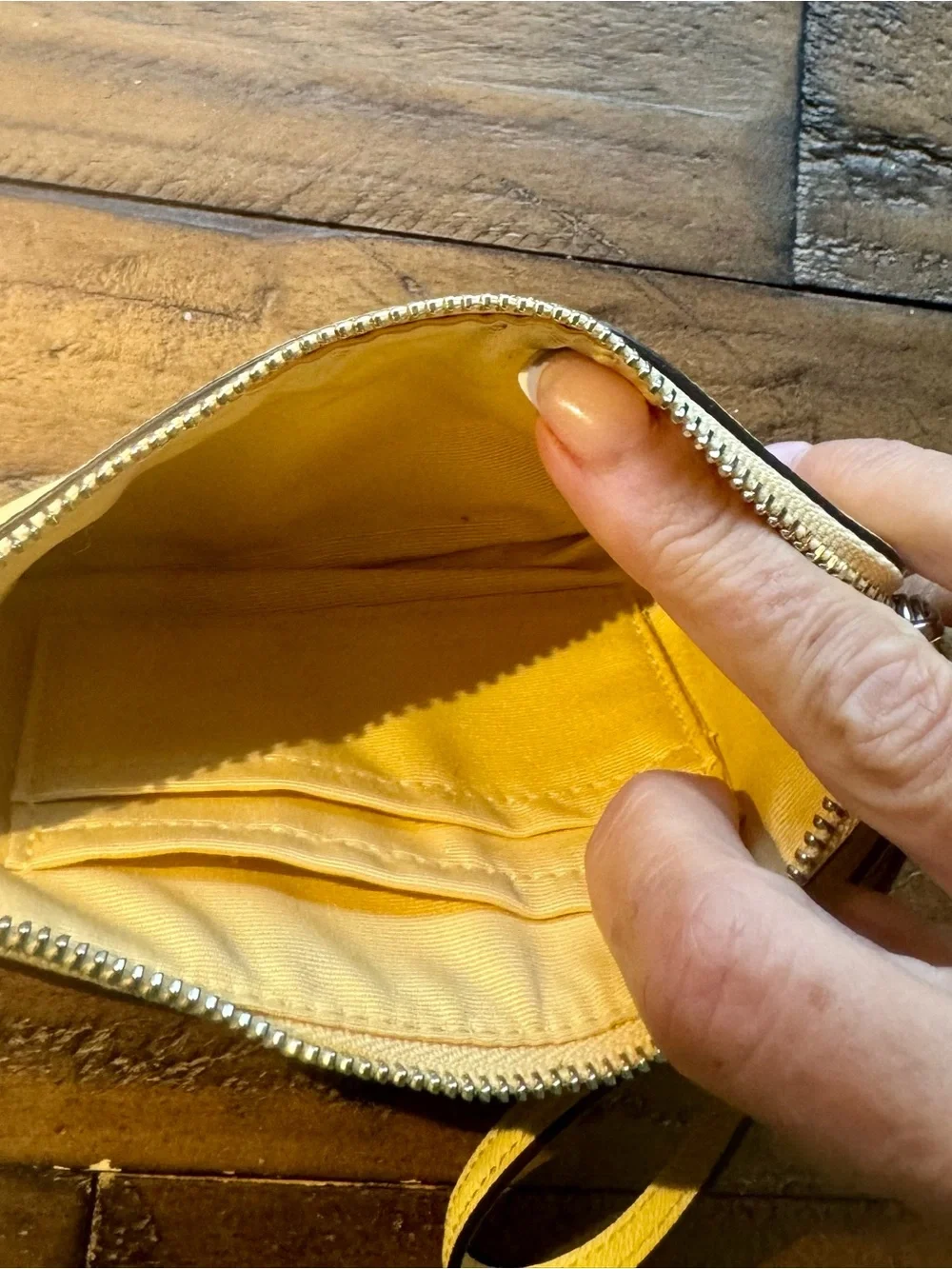 Coach Pale Yellow Pebbled Leather Wristlet
